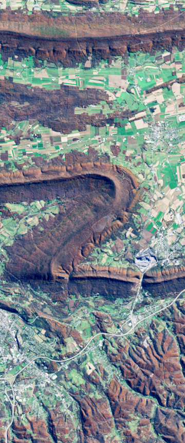 Landsat satellite image showing a folded mountain ridge forming the number 2.