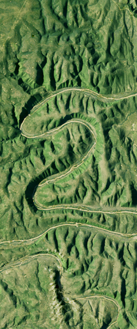 Landsat satellite image showing a winding river canyon forming the number 2.