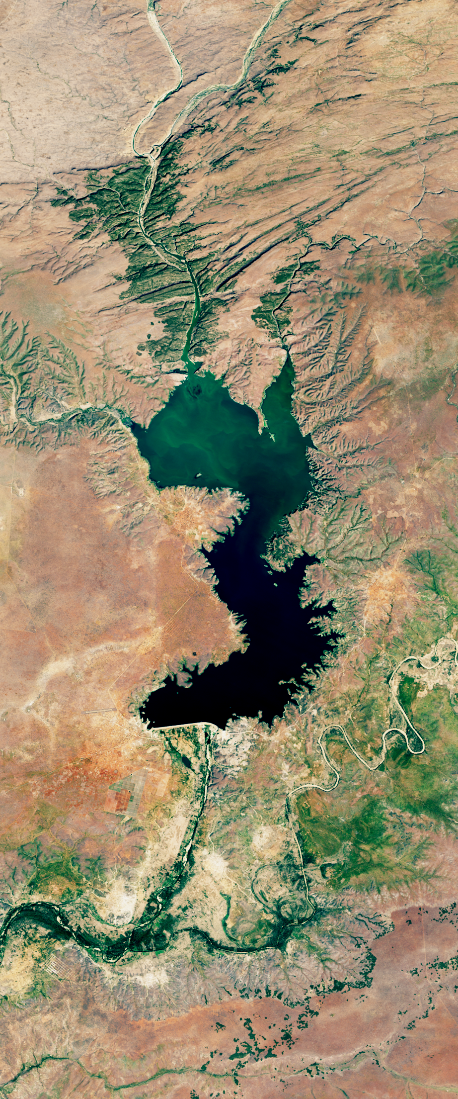 Landsat satellite image showing a lake forming the number 3.