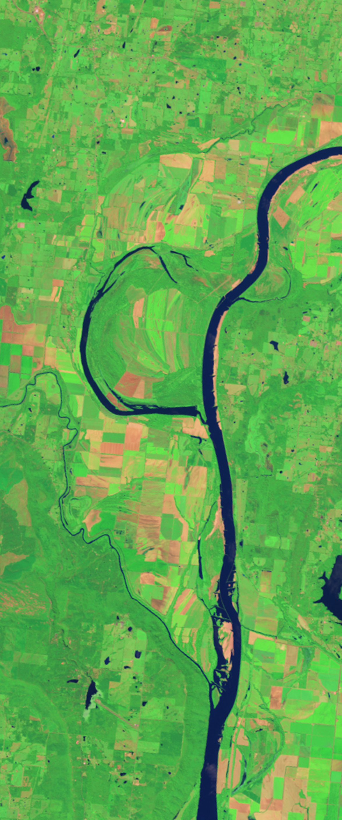 Landsat satellite image of a river shaped like the number 9.