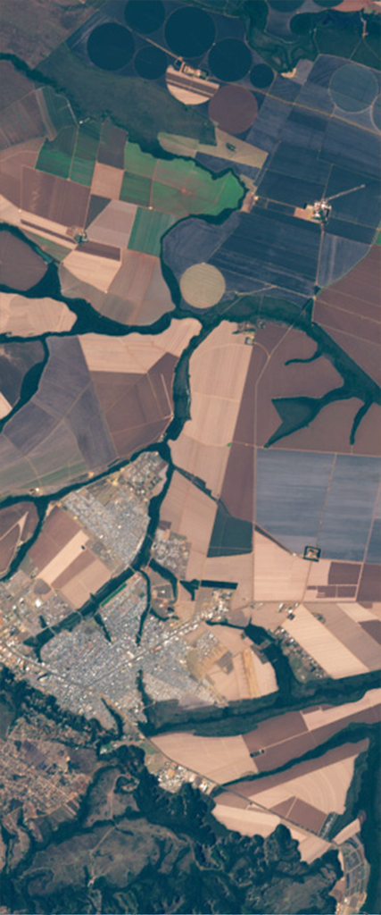 Landsat satellite image of forested areas in the form of the lower case letter Z.