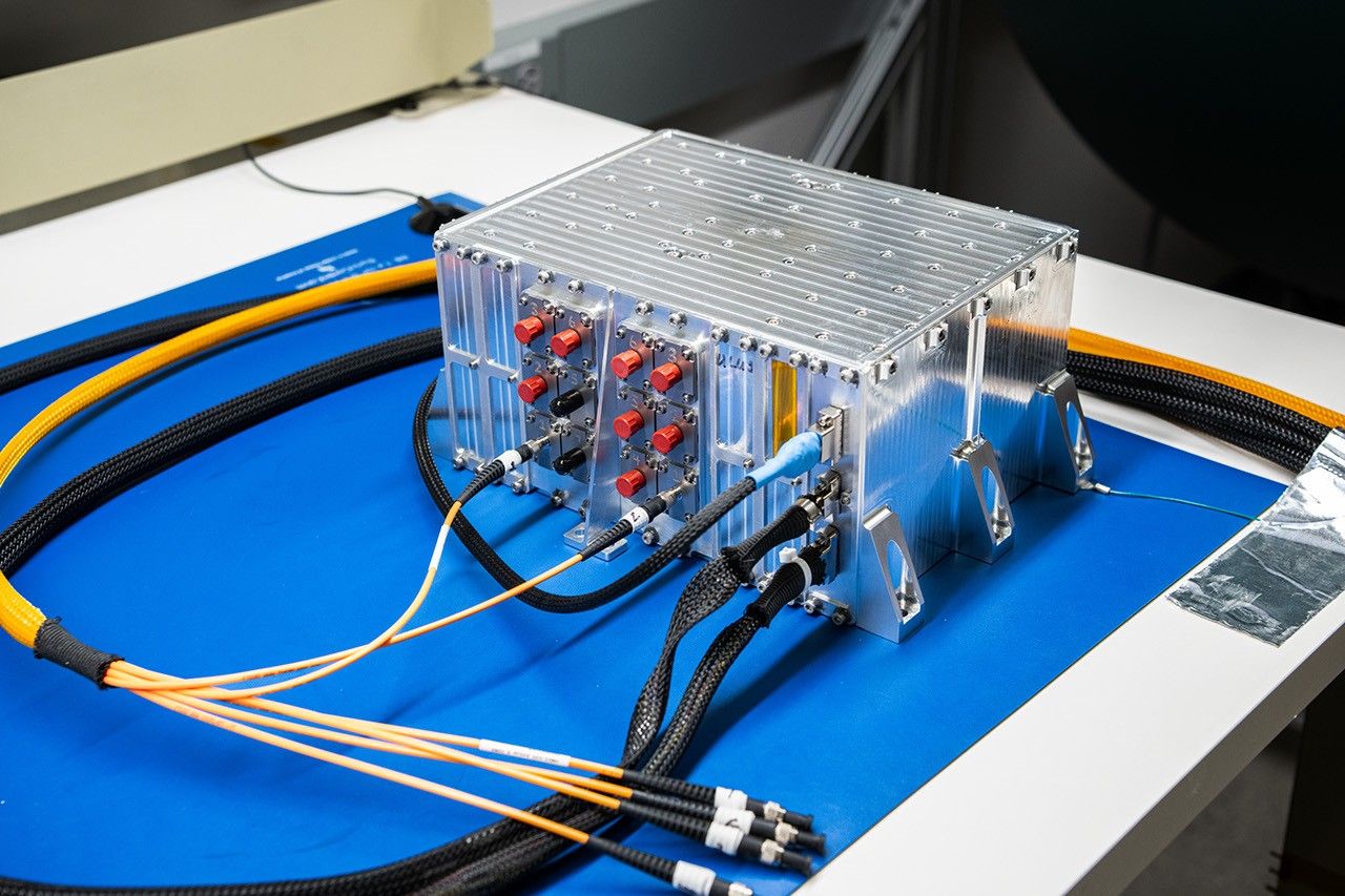 An instrument rests on a lab bench.