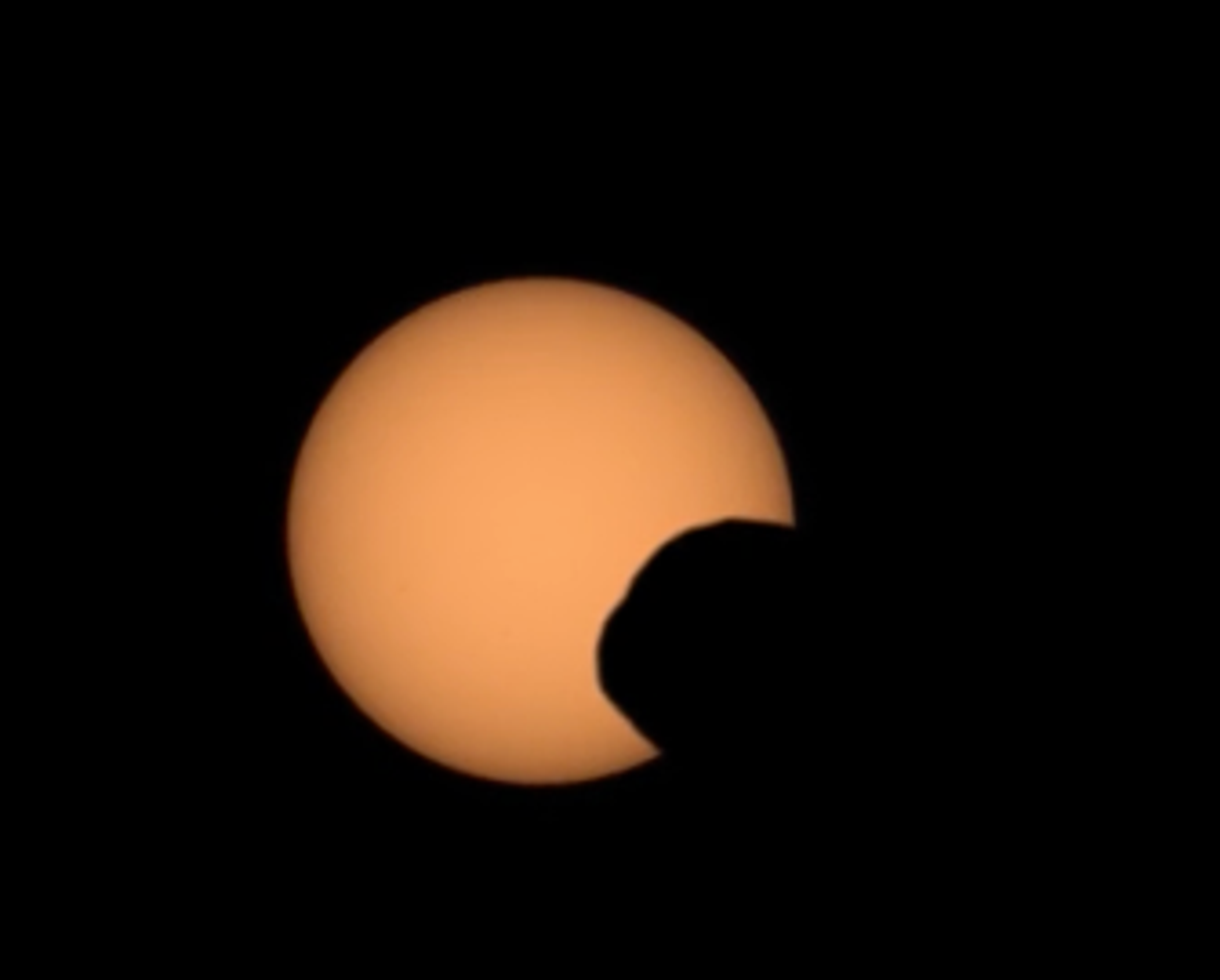 NASA’s Perseverance rover captured the silhouette of the Martian moon Phobos as it passed in front of the Sun on Sept. 30, 2024. The video shows the transit speeded up by four times, followed by the eclipse in real time.