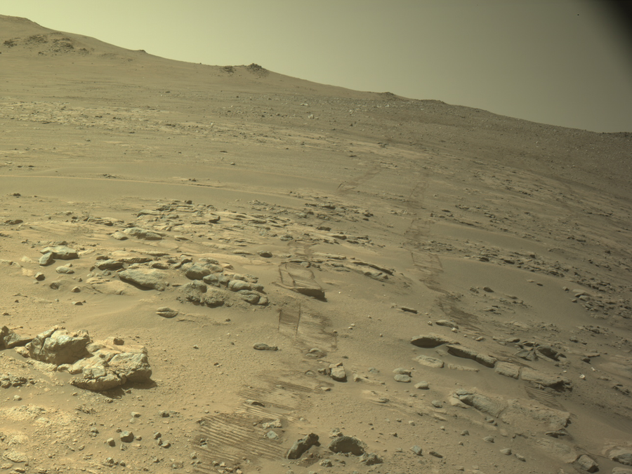 One of Perseverance’s navigation cameras captured this shot on Oct. 11, 2026, the Martian day, or sol, that a 299.6-foot (91.31-meter) drive pushed the rover’s total mileage past Opportunity’s 28.06-mile (45.16-kilometer) record on Mars.