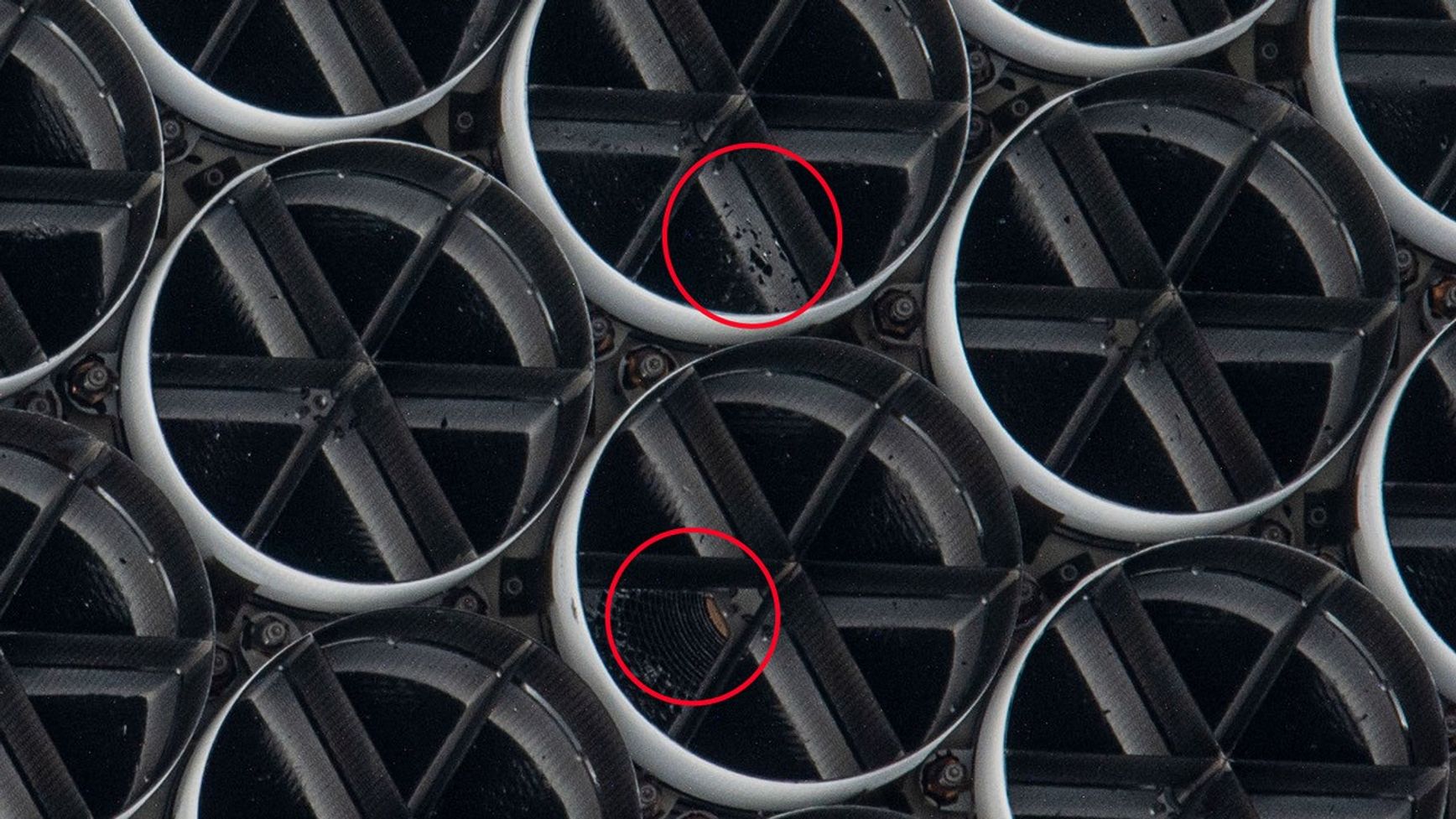 A close-up of damage to NICER's thermal shields