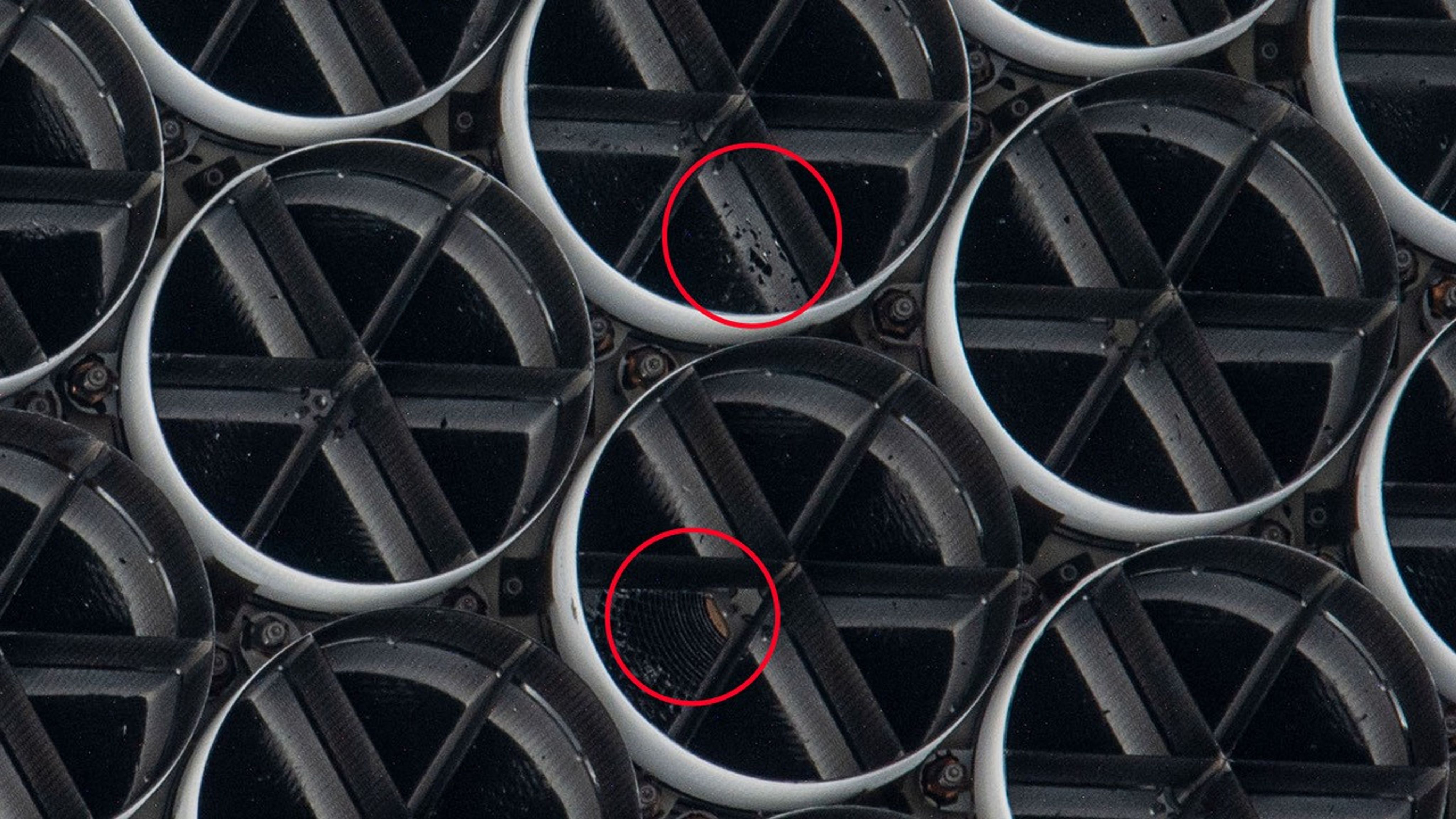 A close-up of damage to NICER’s thermal shields