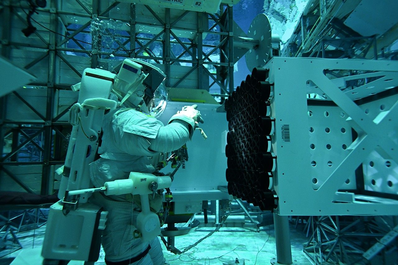 An astronaut in a pool