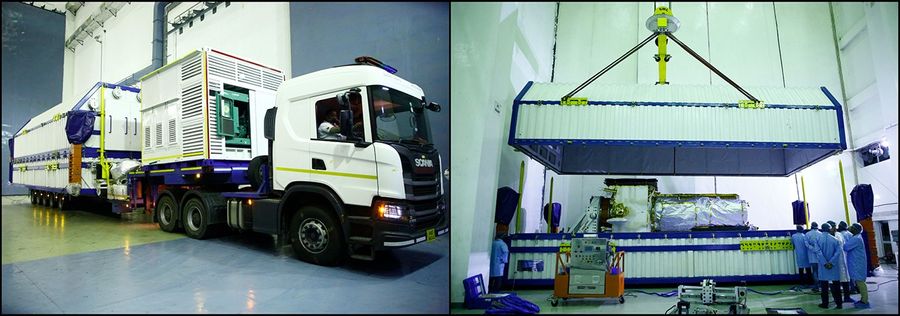 A two-panel image showing the NISAR satellite's arrival and preparation at a facility. The left panel depicts a white truck transporting a large, long white and blue container into a high-bay industrial building. The right panel shows the top half of the container being lifted by an overhead crane, revealing the NISAR satellite stowed below it. Several technicians in blue cleanroom suits and caps are observing the operation.