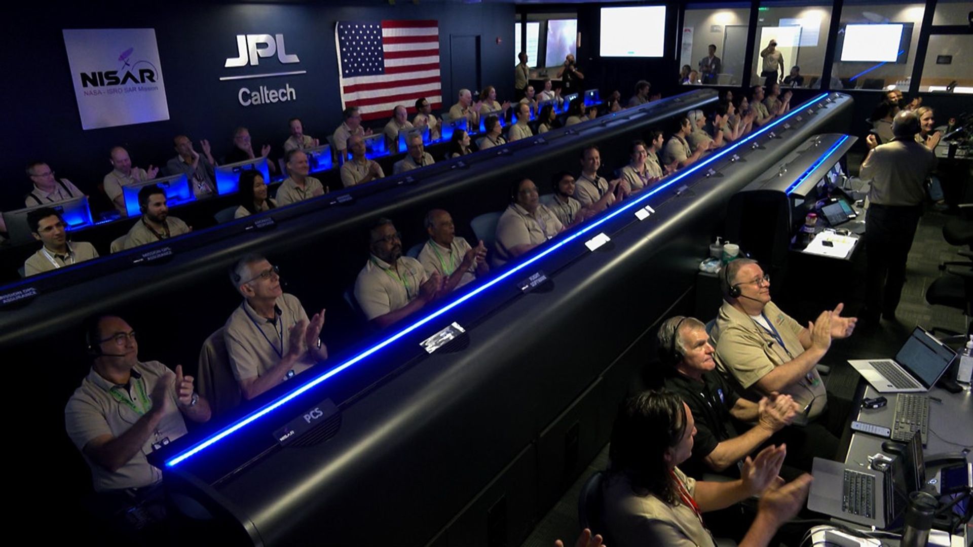 About 20 minutes after NISAR’s launch, members of the mission team celebrate third-stage separation in mission control at NASA’s Jet Propulsion Laboratory in Southern California.
