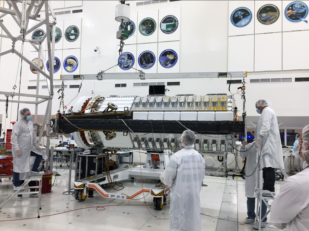 Engineers assemble NISAR's lower antenna boom in the clean room at NASA's Jet Propulsion Laboratory