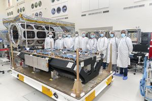 Members of the integration and test team from NASA’s Jet Propulsion Laboratory and the Indian Space Research Organization (ISRO) pose with NISAR’s S-synthetic aperture radar (S-SAR) instrument in the clean room at NASA's Jet Propulsion Laboratory