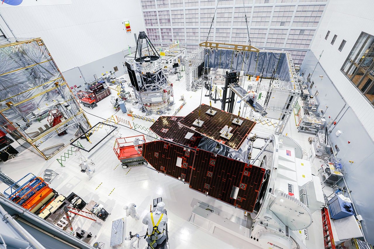Roman solar panels being installed in the Goddard clean room