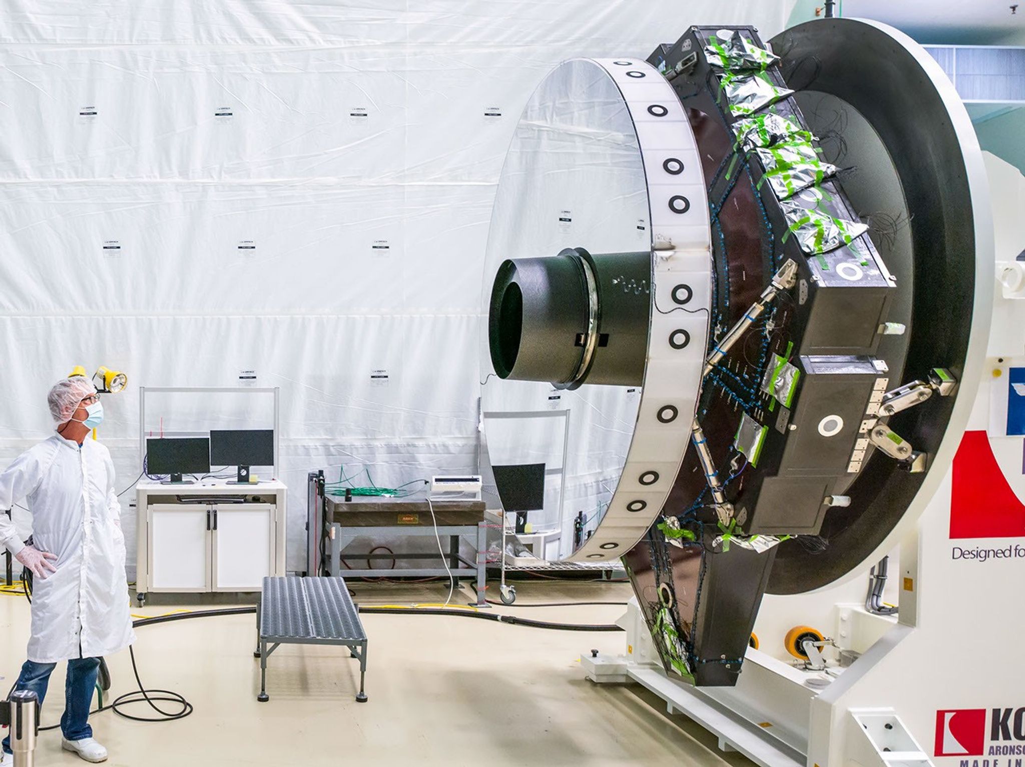 Side profile of a man standing in front of Roman's primary mirror.