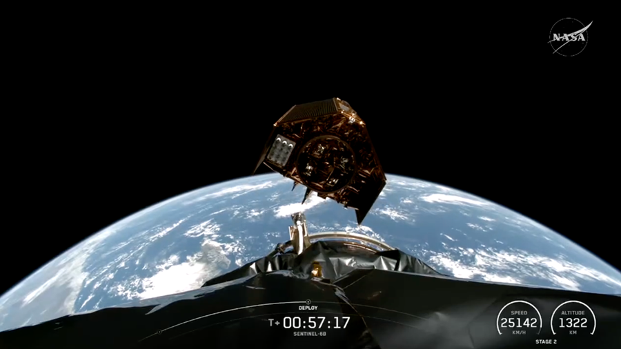 Image shows the Earth in the background and a metallic second stage of SpaceX separating from NASA's Sentinel-6B spacecraft