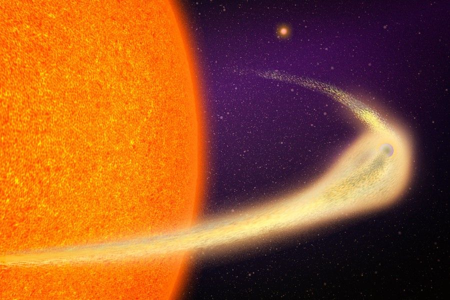 An object disintegrates as it orbits a star.
