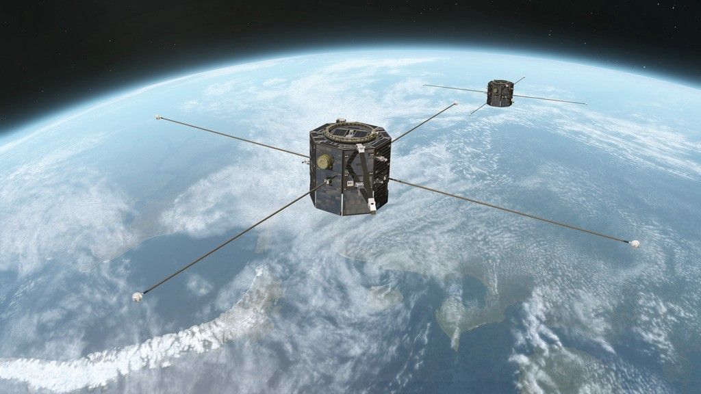 An artist's concept showing TRACERS above Earth. TRACERS is twin satellites, both gray and octagonal, with four poles sticking outward horizontally.