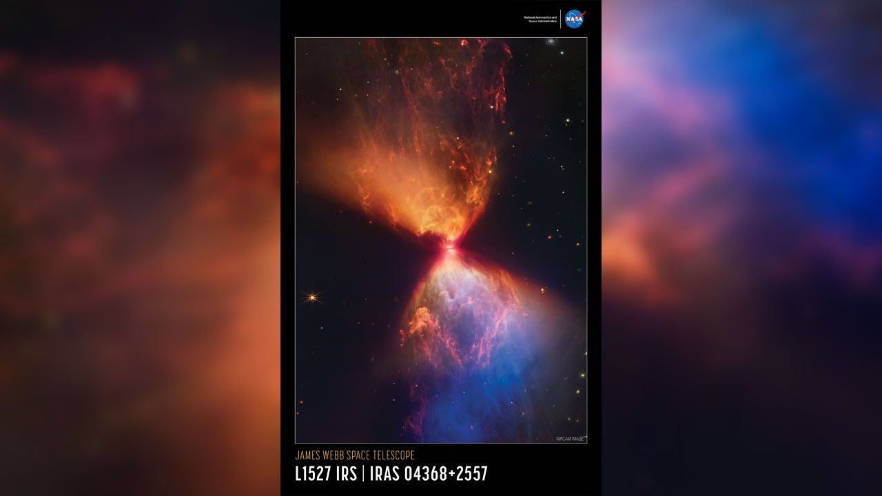 A portrait image of a near-infrared image of L1527 outlined in white, set on a black background. In front of the image’s central, bright orange object, a protostar, is a thin grey line, which is the protostar’s accretion disk. Above and below the protostar are orange, triangular clouds of gas that points to the top left and bottom right of the image respectively. The bottom cloud is a blend of pronounced blue and orange plumes of gas. Farther toward the bottom right, the color of the gas turns blue. To the top right of the outlined image is NASA’s blue, white and red insignia with the acronym’s meaning, "National Aeronautics and Space Administration", in white text to its left. The words “NIRCam Image” are set in a small white type on the bottom right of the image. The title is set below the image, along the bottom of the poster: “James Webb Space Telescope” appears in small orange type on the top line with “L1527 IRS IRAS 04368+2557” in large white type on the bottom line.