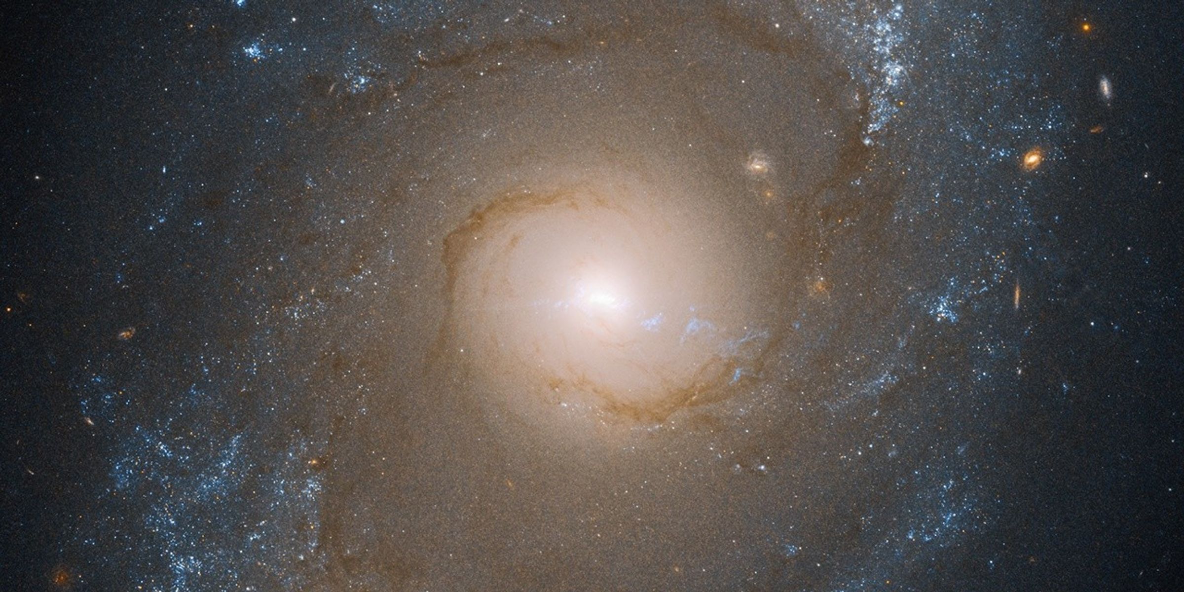 An intermediate spiral Seyfert galaxy named NGC 4151 viewed nearly face-on