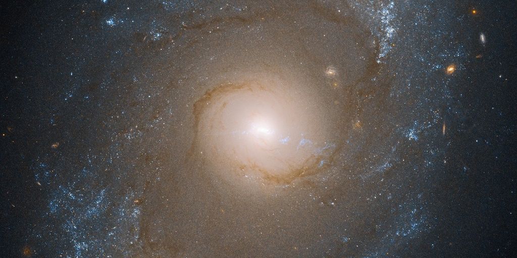 An intermediate spiral Seyfert galaxy named NGC 4151 viewed nearly face-on