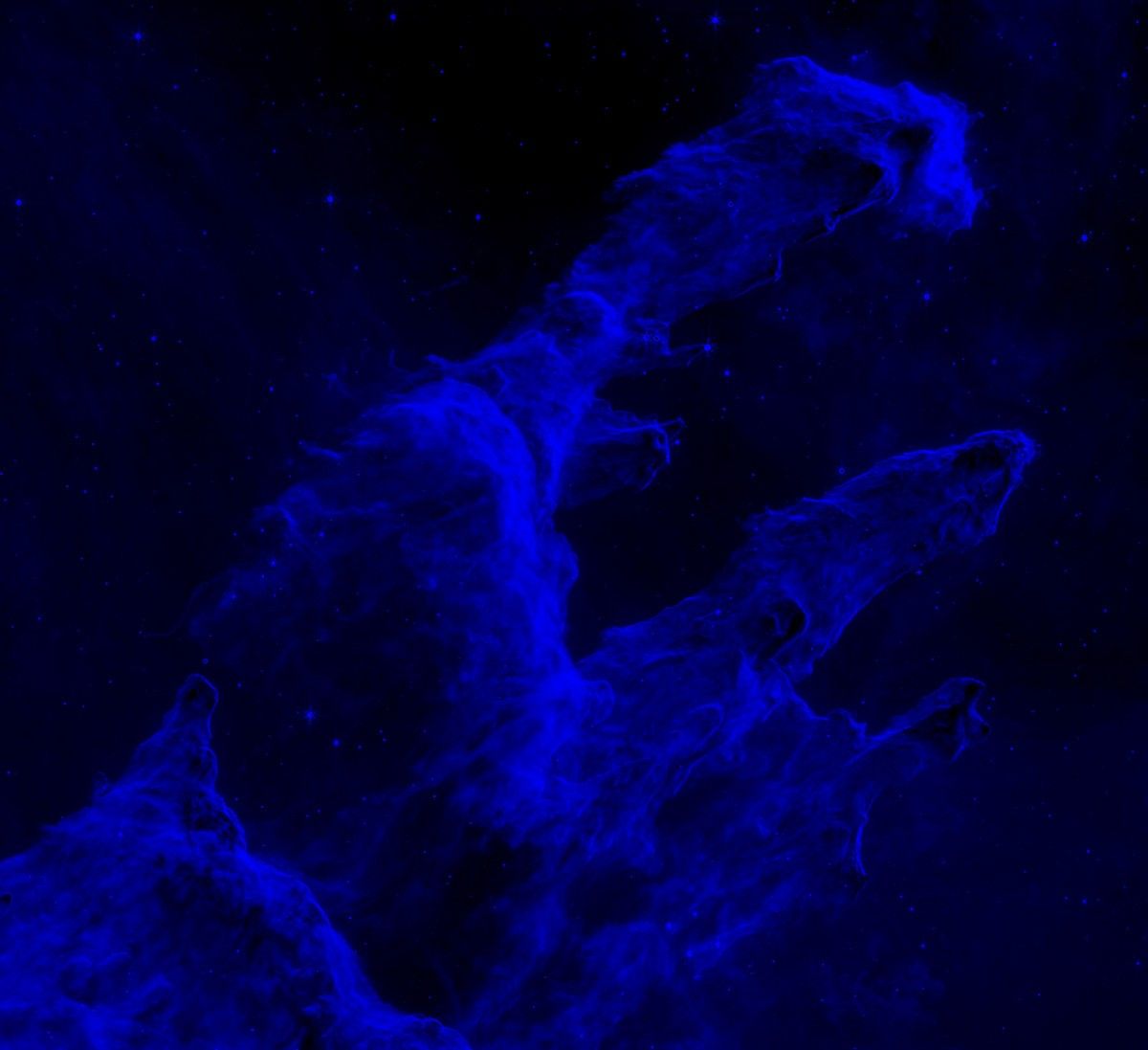 The Pillars of Creation are shown in blue. The edges of the finger-like pillars are brighter blue, while everything else is a deeper blue.