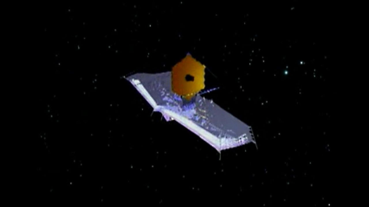 Artist's concept of the James Webb Space Telescope design with a rectangular sunshield and golden hexagon-shaped mirror