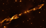 A pair of thin horizontal orange-gold jets are tilted from bottom left to top right, known as Herbig-Haro 212.