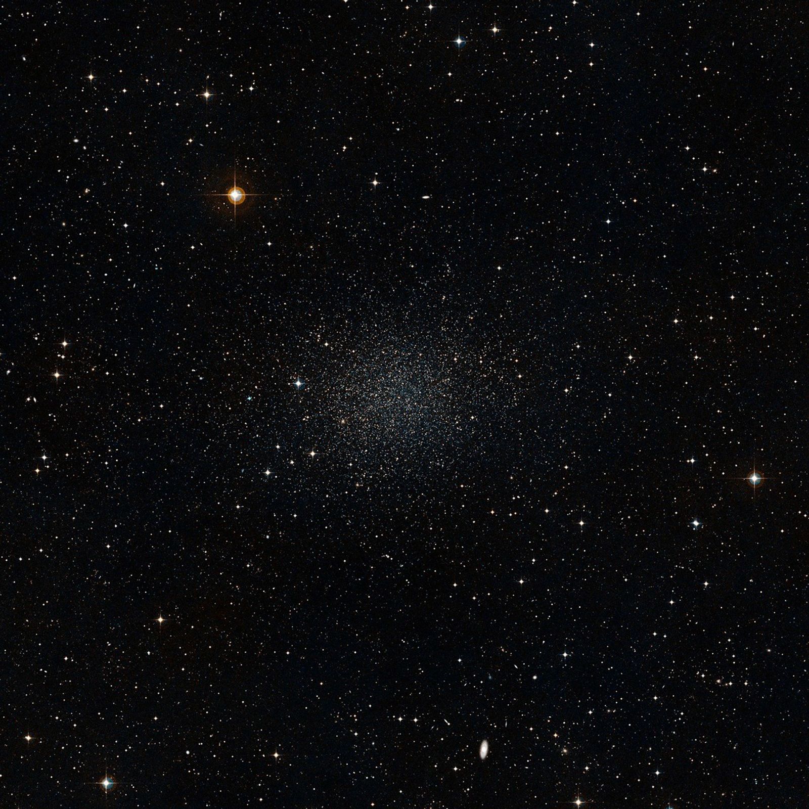 The overall background is black, but it is dotted with pinpricks of white stars throughout. A few stars are slightly larger than others and have diffraction spikes.