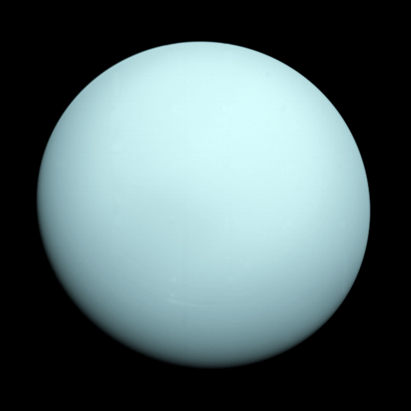 A crisp image of the planet Uranus as observed by Voyager 2. The planet appears as an almost uniform light blue orb.