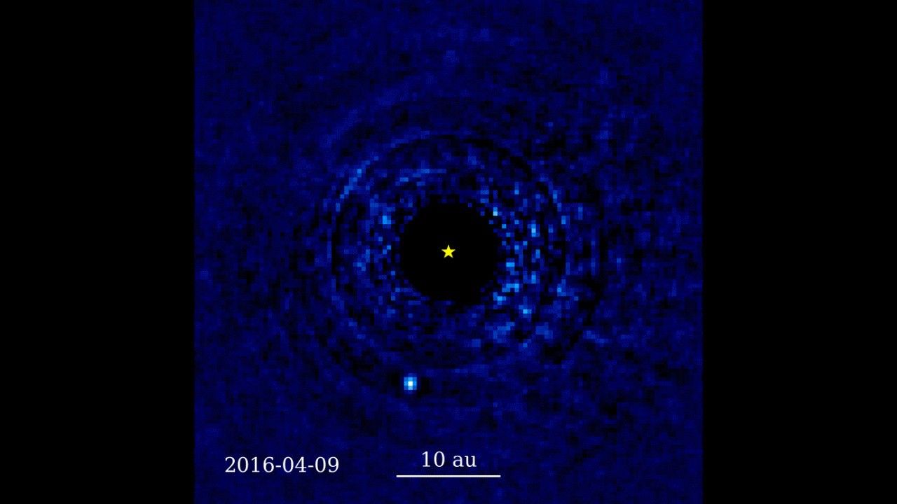 Coronagraph image showing planets orbiting an eclipsed star