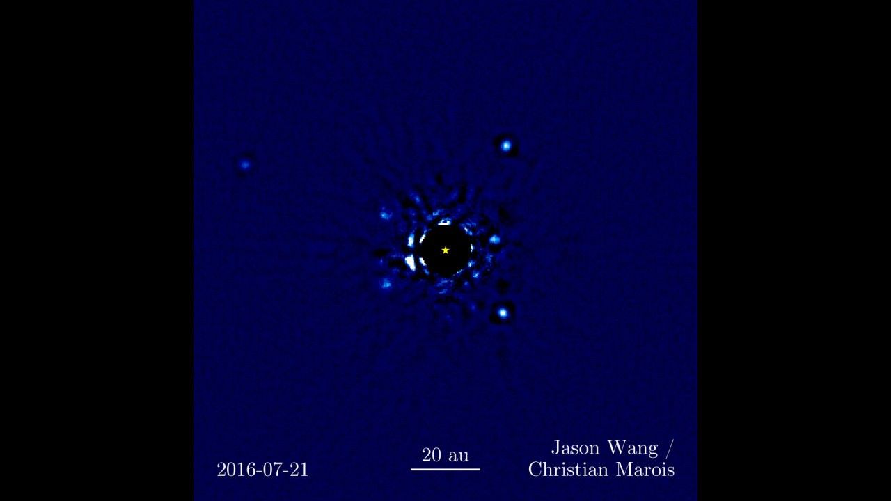 Coronagraph image showing planets orbiting an eclipsed star