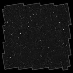 A white square with irregular, jagged edges falls just within the dimensions of the image. Within it is a grayscale field that shows hundreds of bright white points in a range of sizes.