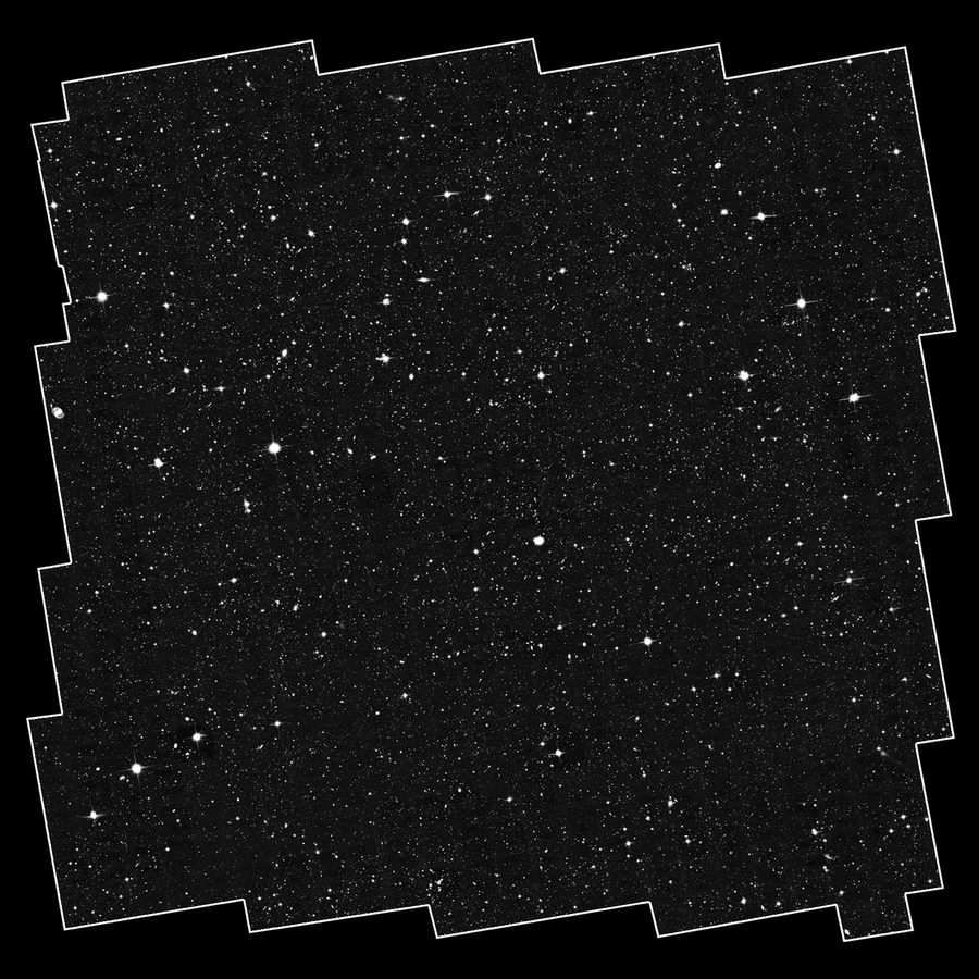 A white square with irregular, jagged edges falls just within the dimensions of the image. Within it is a grayscale field that shows hundreds of bright white points in a range of sizes.