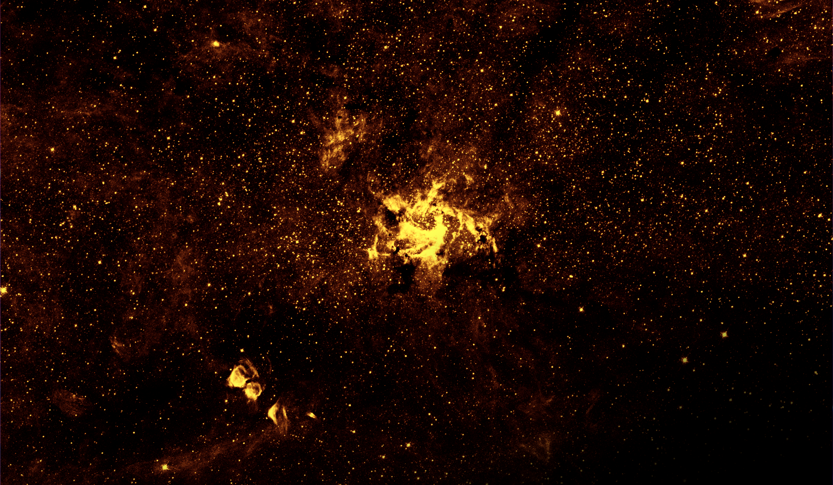 A telescope image showing a multitude of bright yellow stars, star clusters, and dust against a black background.