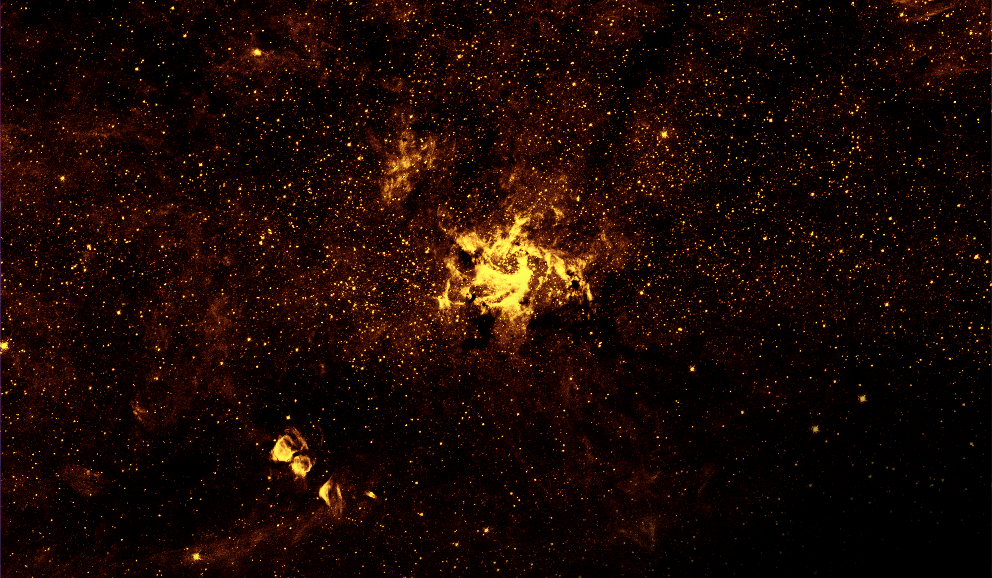 A telescope image showing a multitude of bright yellow stars, star clusters, and dust against a black background.