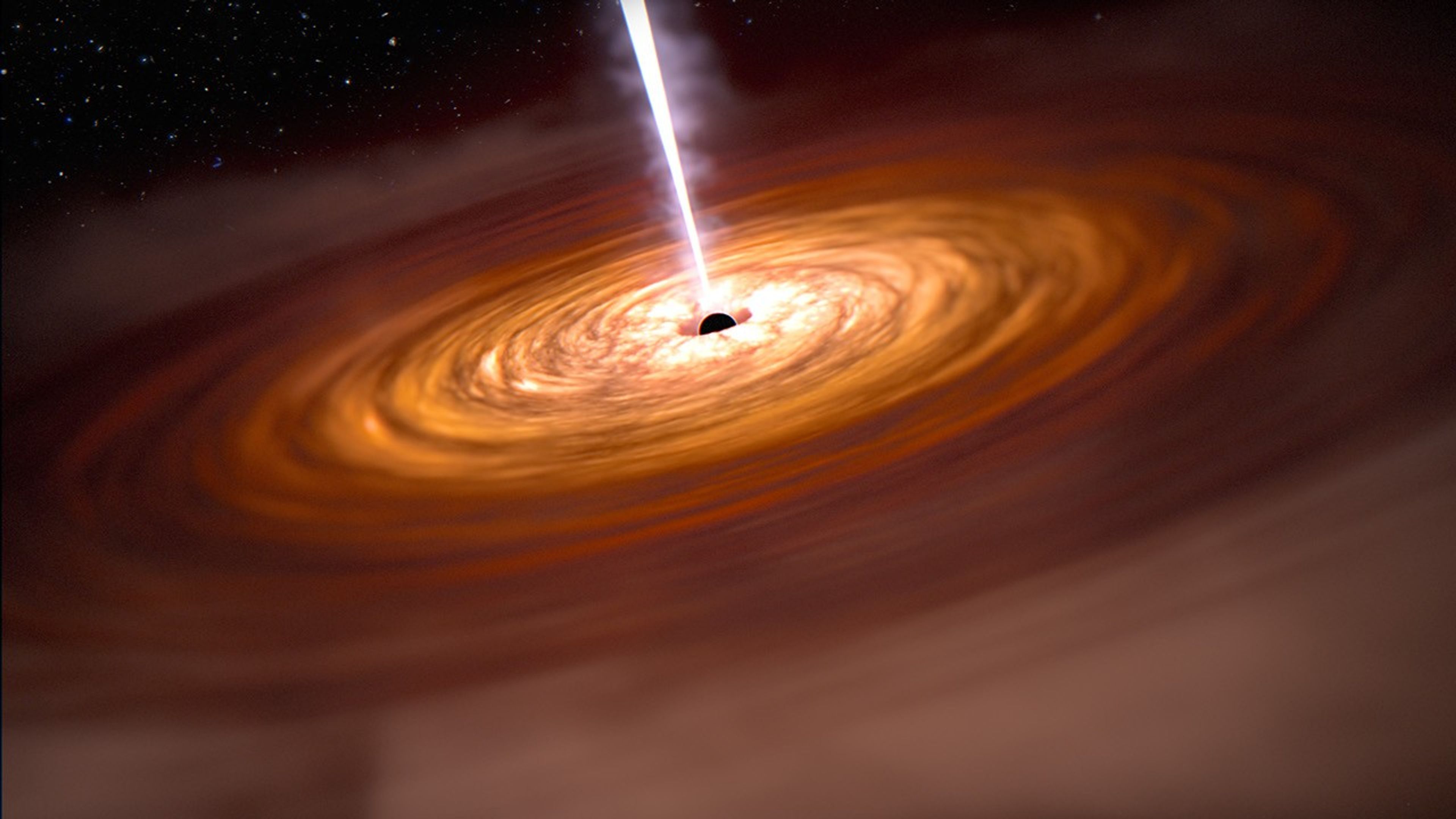 A disk of gas fills the view of this illustration. At the center there is a black dot, which is a black hole, with a thin white line, which is a jet, extending to the top of the image. There are uneven spirals of orange gas that overlap one another from the black dot, extending off the frame. The spirals are whitest toward the center, becoming light orange and progressively darker shades of orange toward the edges of the image. At the top left corner is the surrounding black of space.