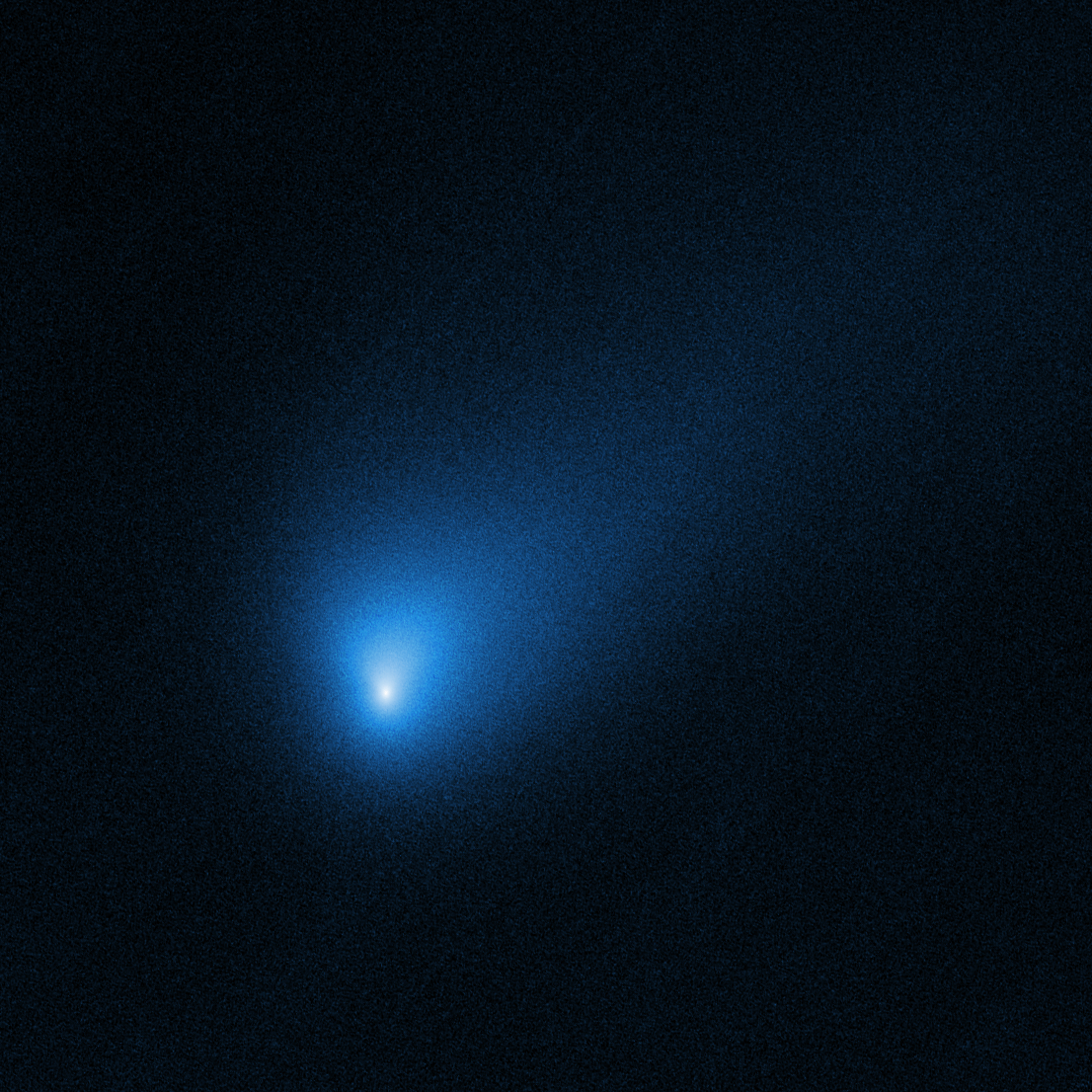 Space telescope image showing a fuzzy blue structure with a bright white center