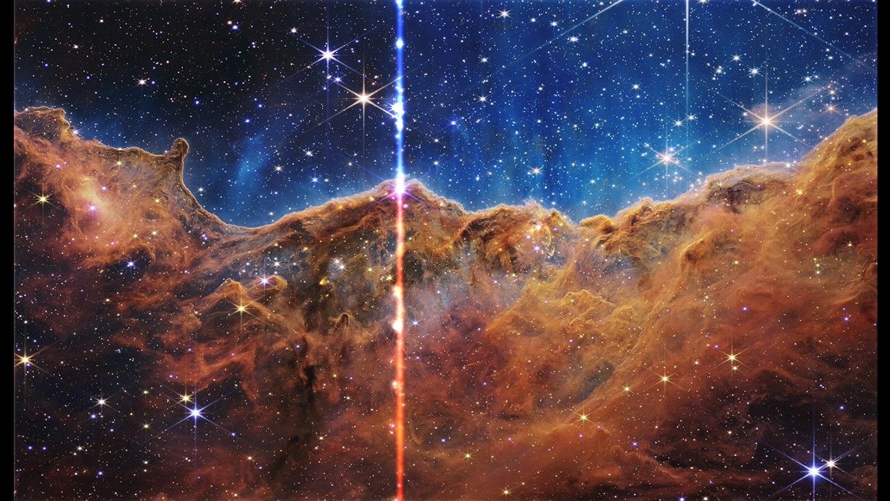 Video still frame showing a glowing vertical line as it sweeps across a near-infrared image that has been sonified. This interpretation is presented as a short video with an integrated soundtrack. There are two versions: Horizontal images that scan features from left to right, and vertical images that scan from top to bottom. Brighter light in the image is louder. The position of light determines the frequency of the sound. Higher pitches represent points closer to the top or right of the image. For full descriptions, download the Audio Description Word document.