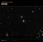 Image titled “Neptune Wide Field (NIRCam)” with compass arrows and color key. In the center is a small, glowing sphere accompanied by a bright point of light with eight spikes. Hundreds of small galaxies splatter the black background, some are orange and others are white. At the bottom left are compass arrows indicating the orientation of the image on the sky. The north arrow points in the 11 o’clock direction. The east arrow points toward 8 o’clock. Below the image is a color key showing NIRCam filters were used to create the image and which visible-light color is assigned to each filter. NIRCam Filters from left to right: F140M is blue; F210M is green; F300M is red; F460W is red.