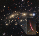 A field of galaxies on the black background of space. At center left, a particularly prominent linear feature stretches vertically. It is outlined by a white box, and a lightly shaded wedge leads to an enlarged view at the bottom right. A spot near the middle of the feature is labeled “Mothra.”