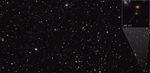 A rectangular image with thousands of galaxies of various shapes and colors on the black background of space. One galaxy is highlighted and labeled GN-z11.