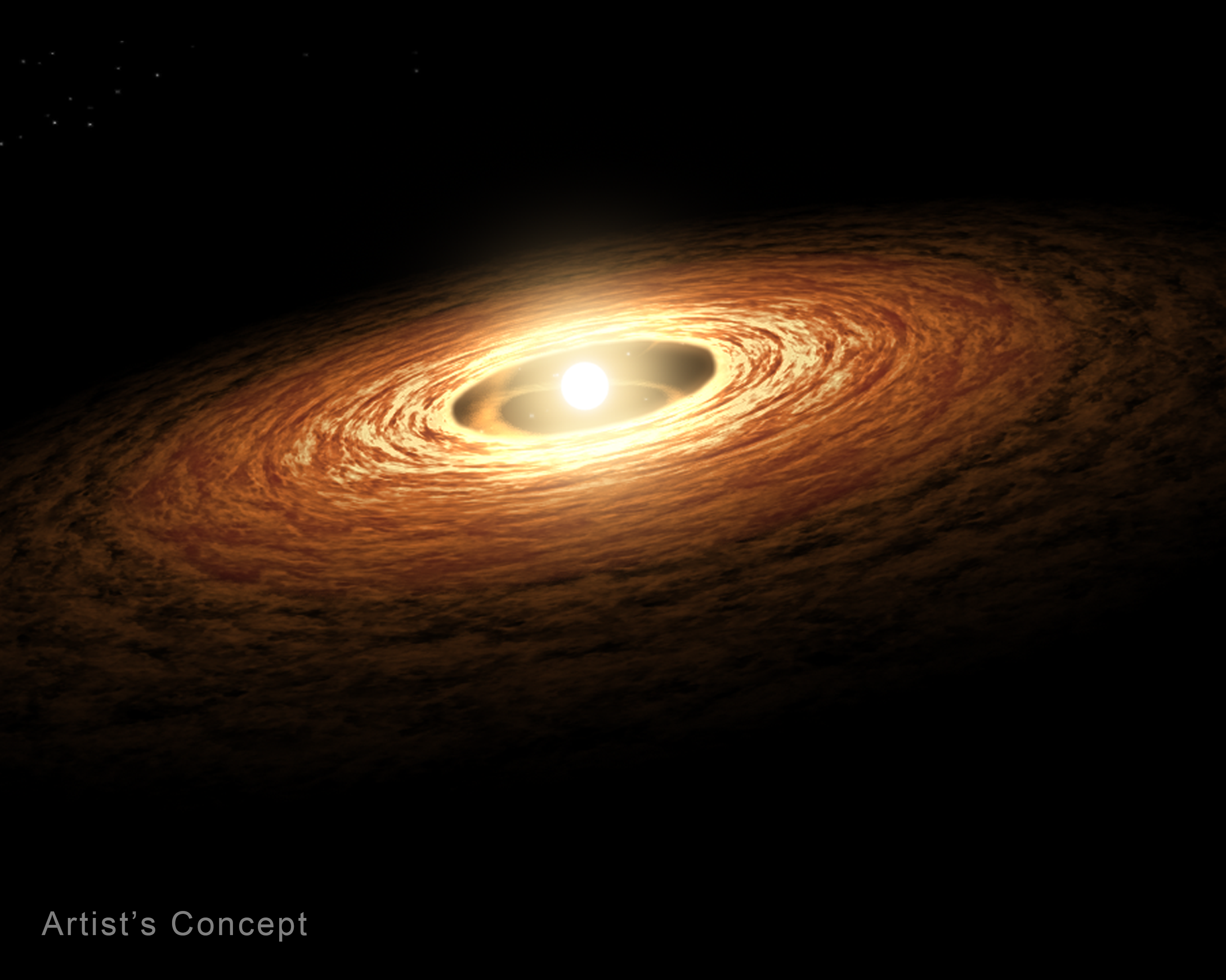 A yellow star is at the center, surrounded by a mottled disk of gas and dust that transitions from bright yellow to darker orange moving outward. The wide disk stretches from about 8 o'clock to 2 o'clock and is tilted so that the nearer side is toward the viewer. A label at lower left says “artist’s concept.”