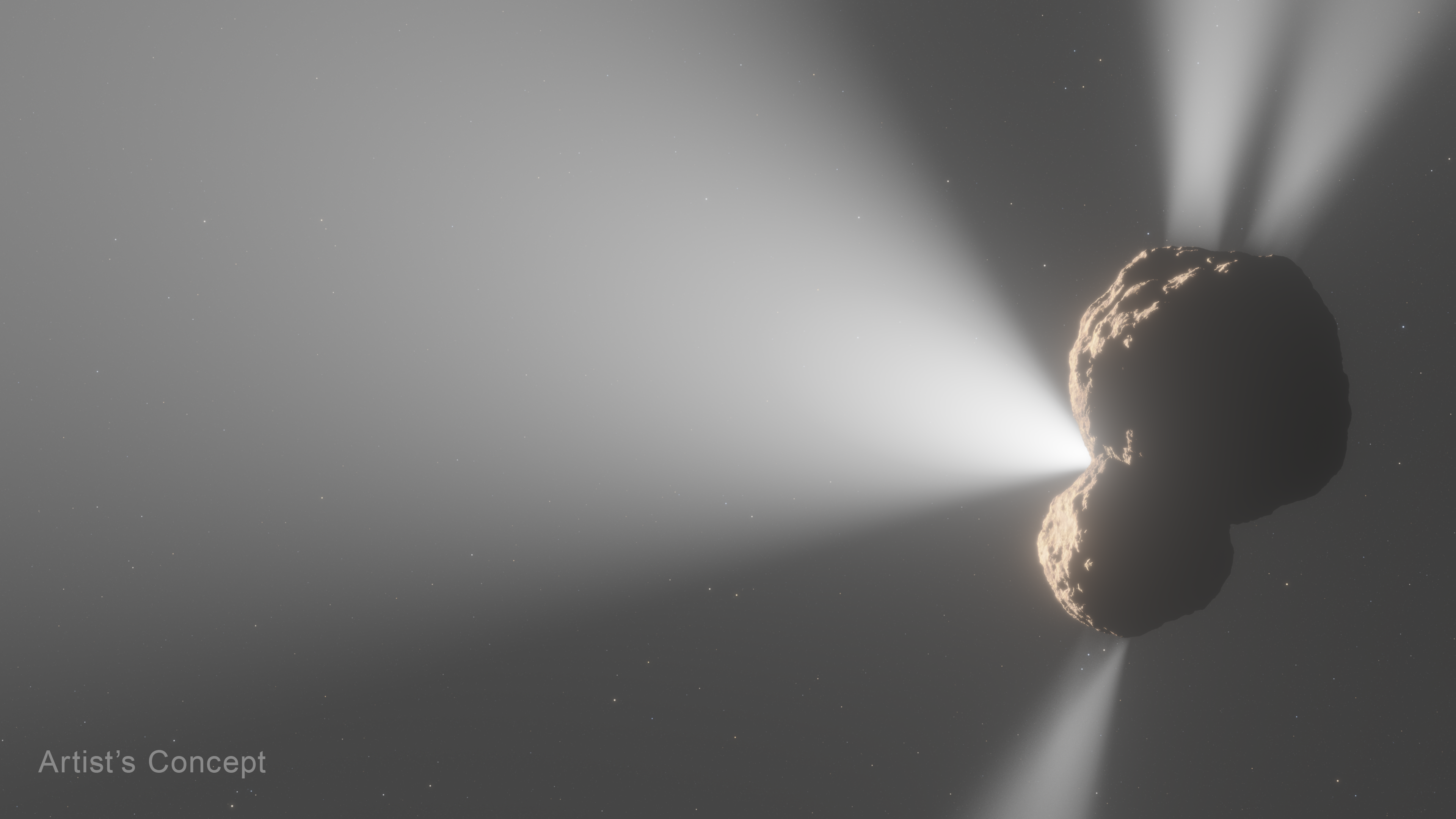 Artist’s concept of Centaur 29P/Schwassmann-Wachmann 1 as seen from the side against a dark, mostly starless swath of space. The rocky, bilobed nucleus is toward the right and resembles the simplified shape of a peanut. The left side of the centaur is partially illuminated by the Sun, which is off-screen, revealing the nucleus’ light brown surface. Four jets of gas, depicted as translucent cones of white, emanate from various points on the Centaur’s surface and extend beyond the frame. A label in the bottom left corner reads “Artist’s Concept.”