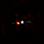 This image shows the exoplanet 51 Eri b. The image is mostly black, with very faint residual red dots apparent in the central region of the image. At the center of the image, there is a symbol representing a star labeled 51 Eri. This star blocks the light from the host star. To the left of the circle is a fuzzy bright red circle, which is the exoplanet, labeled b.