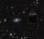 Webb image shows hundreds of galaxies of all shapes and sizes against the black background of space. Toward the center-right is a large box that zooms in to show a faint red dot with the label GRB 250314A.