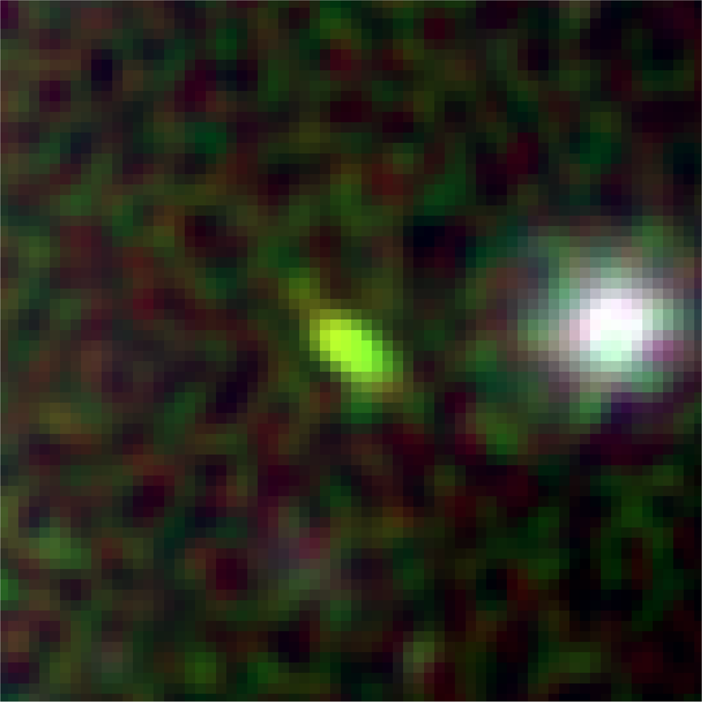 Enlarged view of a single young starburst galaxy. A pixelated green oval extending from upper left to lower right sits in the middle of a red and green checked background. A large white blob is visible at center right.