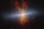 Composite image of edge-on spiral starburst galaxy Messier 82 as observed by NASA's James Webb and Hubble space telescopes. Hourglass-shaped plumes of gas are shooting outward from above and below a bright blue-white, disk-shaped center. The plumes are yellow near the galaxyu2019s bright center, denoting areas of ionized hydrogen gas as observed by Hubble, and gradually become redder as you move farther away. Messier 82 is set against the black background of space, which has many distant galaxies that appear as small white and orange spirals, ovals, and points of light. Toward the right of Messier 82 is a blue-white star with eight-pointed diffraction spikes that are characteristic of Webb.