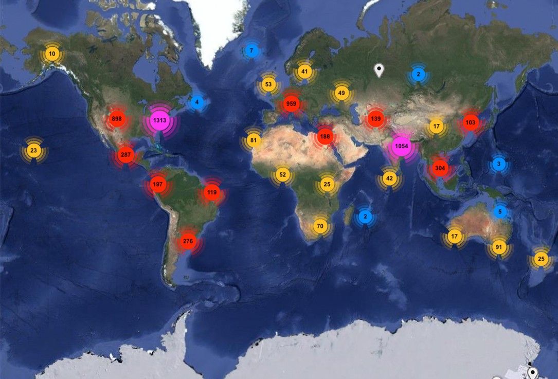 World map with color circles with numbers over land areas.