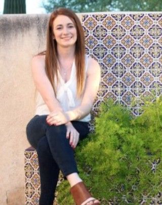 Portrait of a smiling woman.