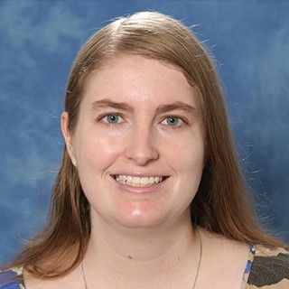 Portrait of a smiling woman.