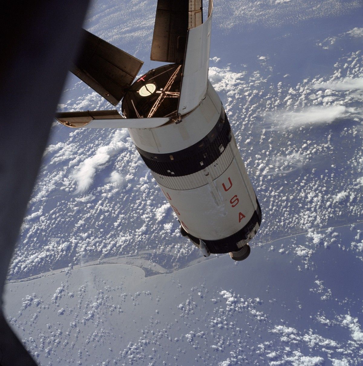 Saturn S-7B stage in space with Earth in background
